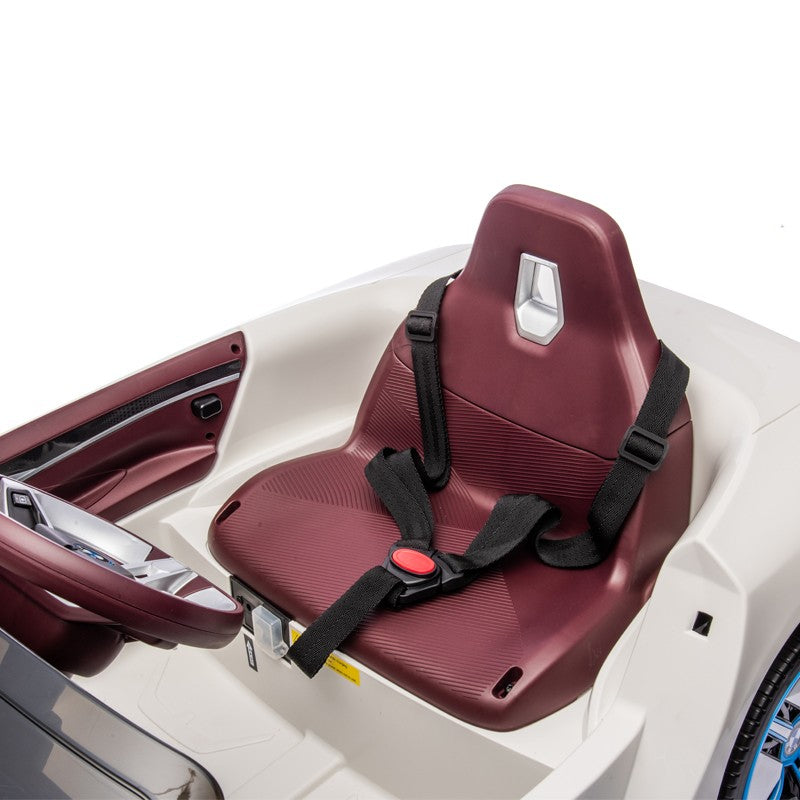 Masinuta electrica BMW I4, 2X25W, Bluetooth, MP3, lumini LED fata-spate, suspensii, roti spuma EVA, scaun maro