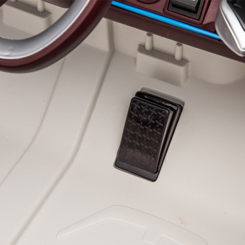 Masinuta electrica BMW I4, 2X25W, Bluetooth, MP3, lumini LED fata-spate, suspensii, roti spuma EVA, scaun maro